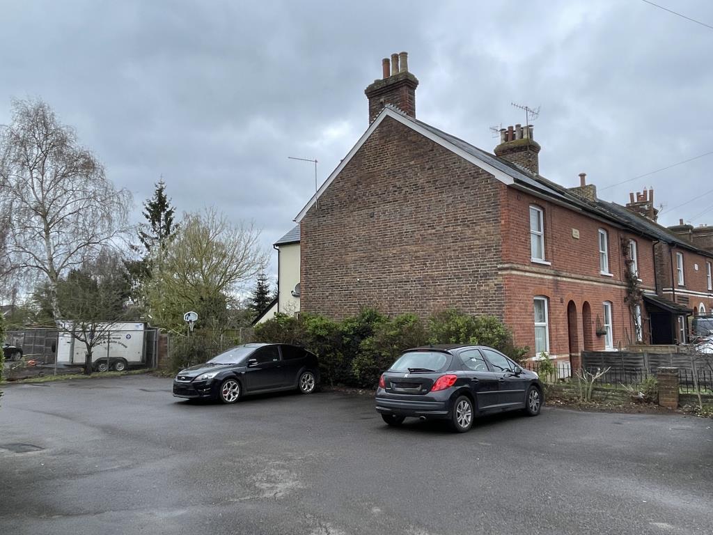 Lot: 96 - DETACHED PAIR OF SEMI-DETACHED PROPERTIES ARRANGED AS OFFICES WITH POTENTIAL FOR CONVERSION - view of side car parking area